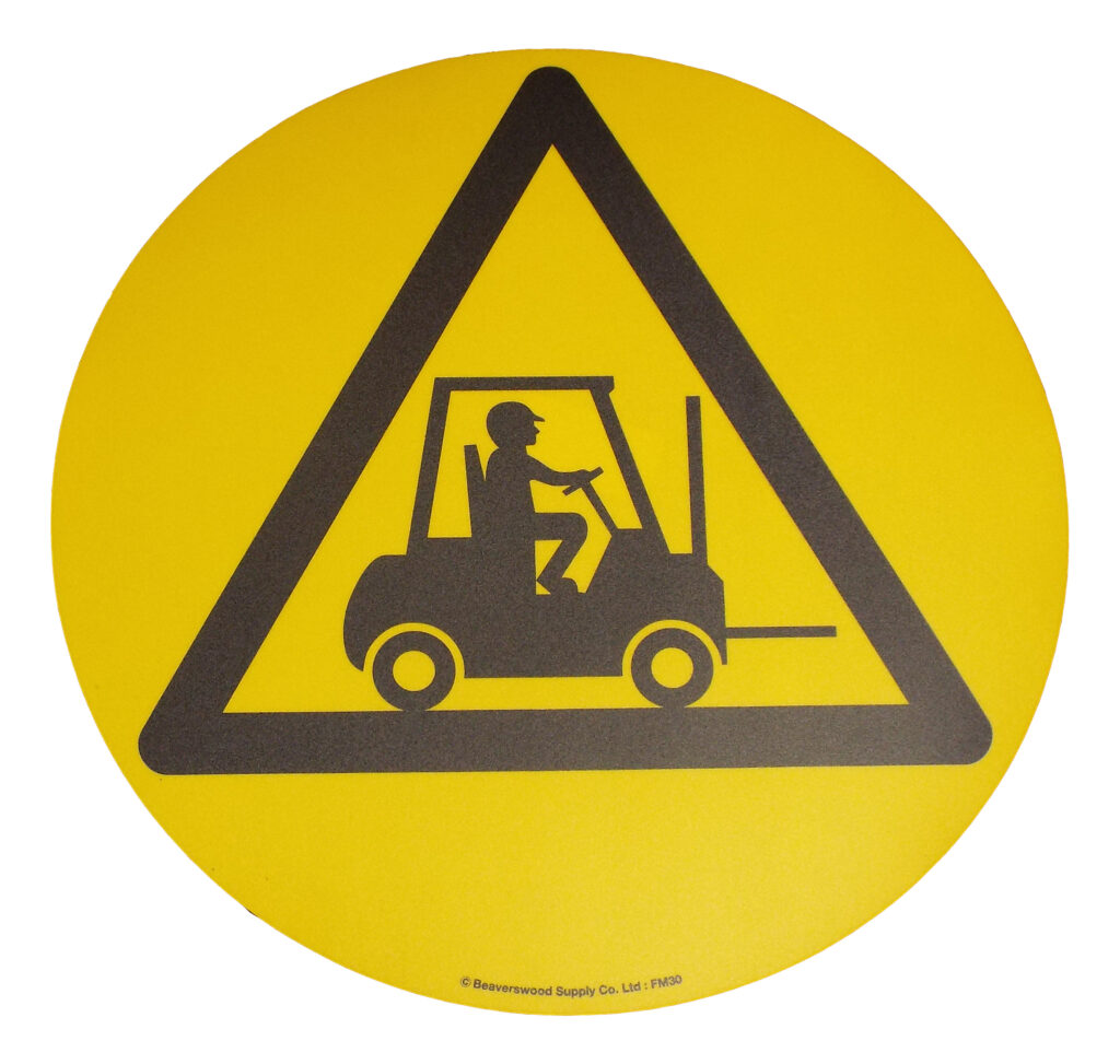 Large round floor floor sign warning of fork lift area